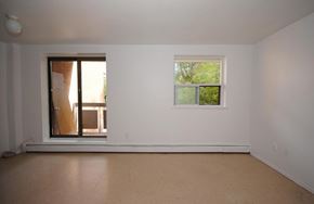 Hamilton apartment for rent - A room with a window and a door leading outside.