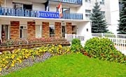 Hamilton apartment for rent - A building with a sign that says "Helvetia" on it.