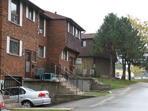 Hamilton apartment for rent - A car is parked on the side of a street.