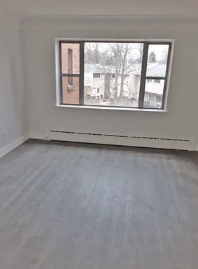 Dundas apartment for rent - A room with a window and a white wall.