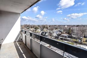 Stoney Creek apartment for rent - A balcony overlooks a residential neighborhood.