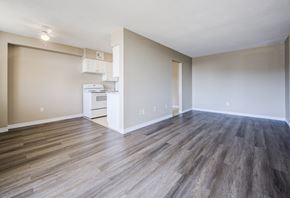 Hamilton apartment for rent - A kitchen area with a white oven and microwave.