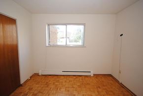 Hamilton apartment for rent - A room with a window and a radiator on the floor.