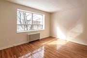 Hamilton apartment for rent - A room with a window and a radiator on the floor.