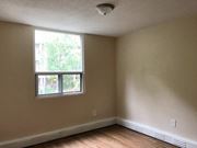 Hamilton apartment for rent - A room with a window and a smoke detector on the ceiling.