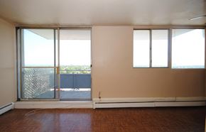 Hamilton apartment for rent - A room with a sliding glass door leading to a balcony.