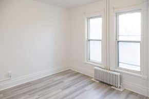 Kitchener apartment for rent - A room with a white wall and a window with a white frame.