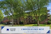 Hamilton apartment for rent - A sign advertising a free month of rent at Effort Trust.