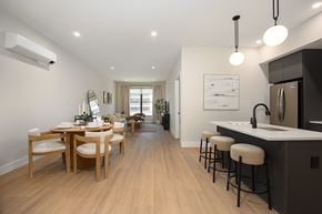 Beacon apartment for rent - A modern kitchen with a dining table and chairs.