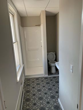 Poughkeepsie apartment for rent - A bathroom with a toilet and a sink.