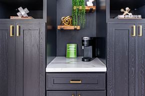 Anaheim apartment for rent - A kitchen with dark wood cabinets and a white countertop. at Tara Hill, Anaheim