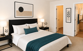 Atlanta apartment for rent - A bedroom with a large bed and a painting above it.