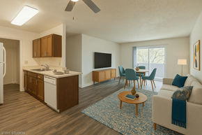 Oakland apartment for rent - A living room with a couch, chairs, and a television at Oak Center Apartments, Oakland