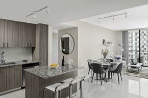Doral apartment for rent - A modern kitchen with a dining  at Palma, Doral, FL