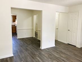 Chesapeake townhouse for rent - A room with white walls and wood flooring.