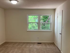 Virginia Beach townhouse for rent - A room with a window and a door.