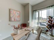 Edmonton apartment for rent - A dining room with a table, chairs, and a painting on the wall.