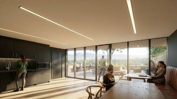 Vancouver apartment for rent - A modern kitchen with people sitting around a table.