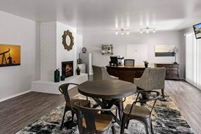 Carlsbad apartment for rent - A modern dining room with a round table and chairs.