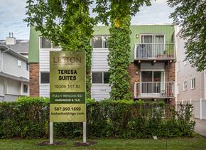 Edmonton apartment for rent - A sign for Leston Teresa Suites is in front of a building.