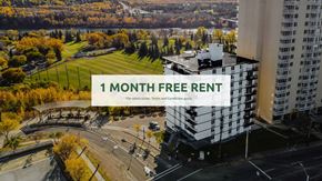 Edmonton apartment for rent - A large building with a sign offering a free one month rent.