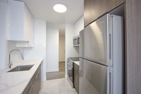 Edmonton apartment for rent - A modern kitchen with a stainless steel refrigerator.