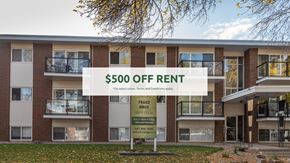 Edmonton apartment for rent - A building with a sign offering $500 off rent.