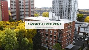 Edmonton apartment for rent - A building with a sign offering a free rent for the first month.