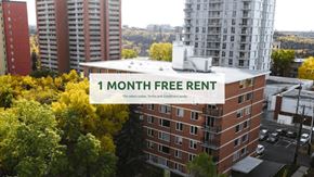 Edmonton apartment for rent - A building with a sign offering a 1 month free rent.