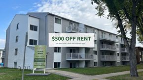 Edmonton apartment for rent - A building with a sign that says $500 off rent.