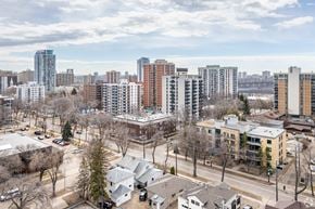 Edmonton apartment for rent - A cityscape with a mix of residential and commercial buildings.