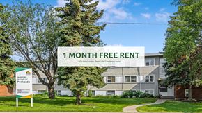 Edmonton apartment for rent - A sign offering a 1 month free rent on select terms and conditions apply.