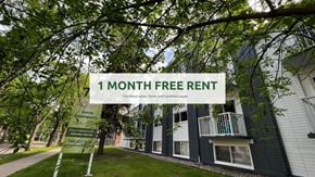 Edmonton apartment for rent - A sign offering a free one month rent for a property.