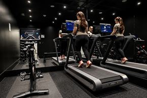 Edmonton apartment for rent - Three women are running on treadmills in a gym.