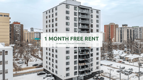 Edmonton apartment for rent - A tall white building with a sign that reads "1 MONTH FREE RENT".