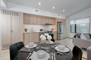 Orillia apartment for rent - A modern dining room with a table set for two at The Grove Apartments, Ontario, L3V 1H4