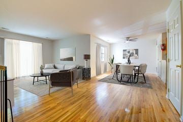 Lakewood apartment for rent - A living room with a brown sofa and a white couch.