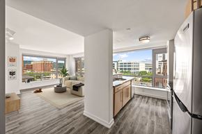 Yonkers apartment for rent - A modern kitchen with a refrigerator on the right side.