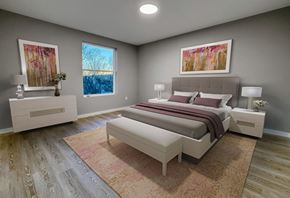 Orange apartment for rent - A bedroom with a large bed and a painting on the wall.