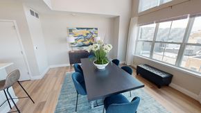 Newark apartment for rent - A dining room with a table and chairs.