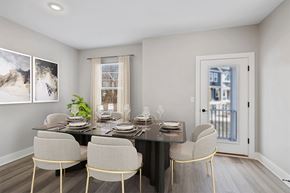 Poughkeepsie apartment for rent - A dining room with a table set for four.