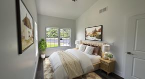 Pine Plains apartment for rent - A bedroom with a large bed and a painting on the wall.