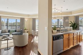 St. Louis Park apartment for rent - A modern kitchen with wooden cabinets and a large island.