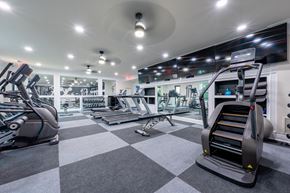Carmel apartment for rent - A gym with treadmills, elliptical machines, and other exercise equipment.