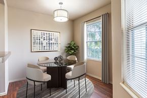 Miamisburg apartment for rent - A dining room with a table and chairs.