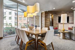 Denver apartment for rent - A dining room with a table and chairs.