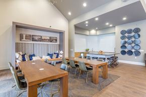 Plymouth apartment for rent - A dining room with a wooden table and chairs.