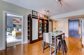 Denver apartment for rent - A dining room with a table set for four.