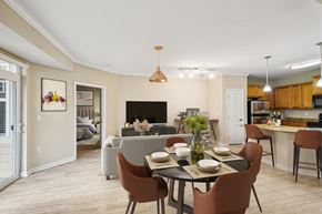 Woodbury apartment for rent - A dining room with a table set for a meal.