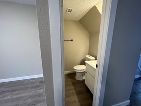 Austin apartment for rent - A bathroom with a toilet and sink.